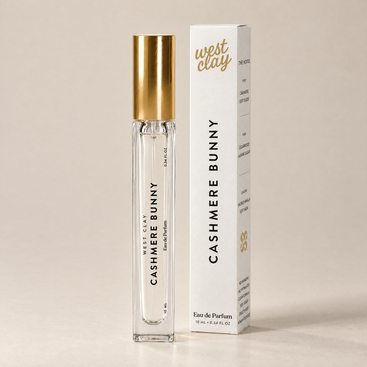 Cashmere Bunny Eau de Parfum by West Clay, 10 mL travel size vial and box studio photo