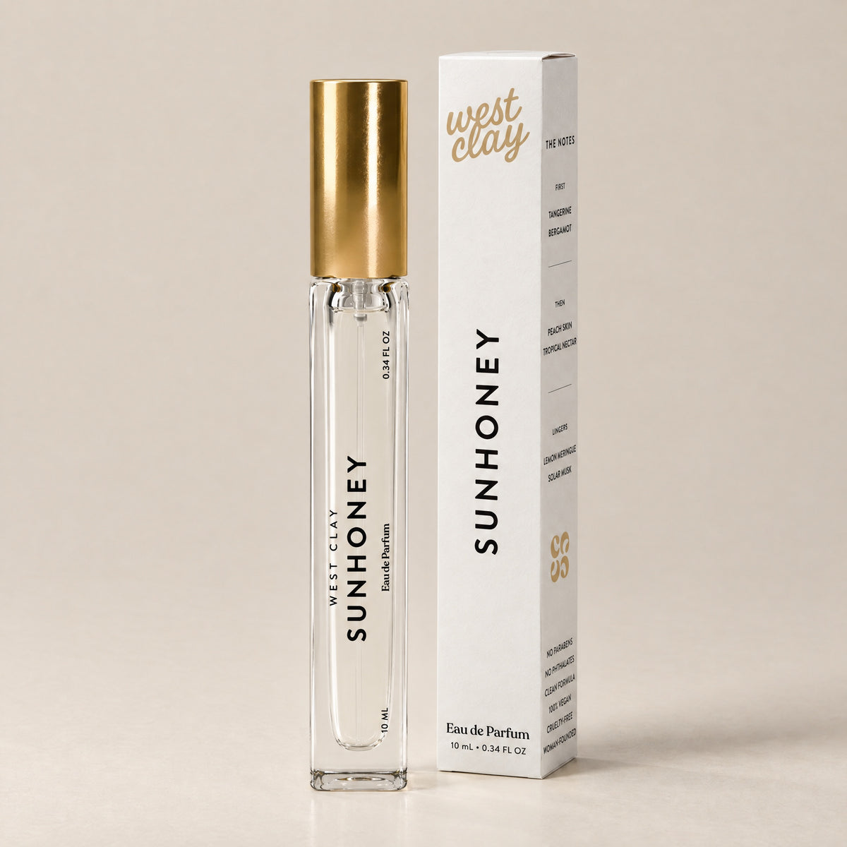 Sunhoney Eau de Parfum by West Clay, 10 mL travel size vial and box studio photo