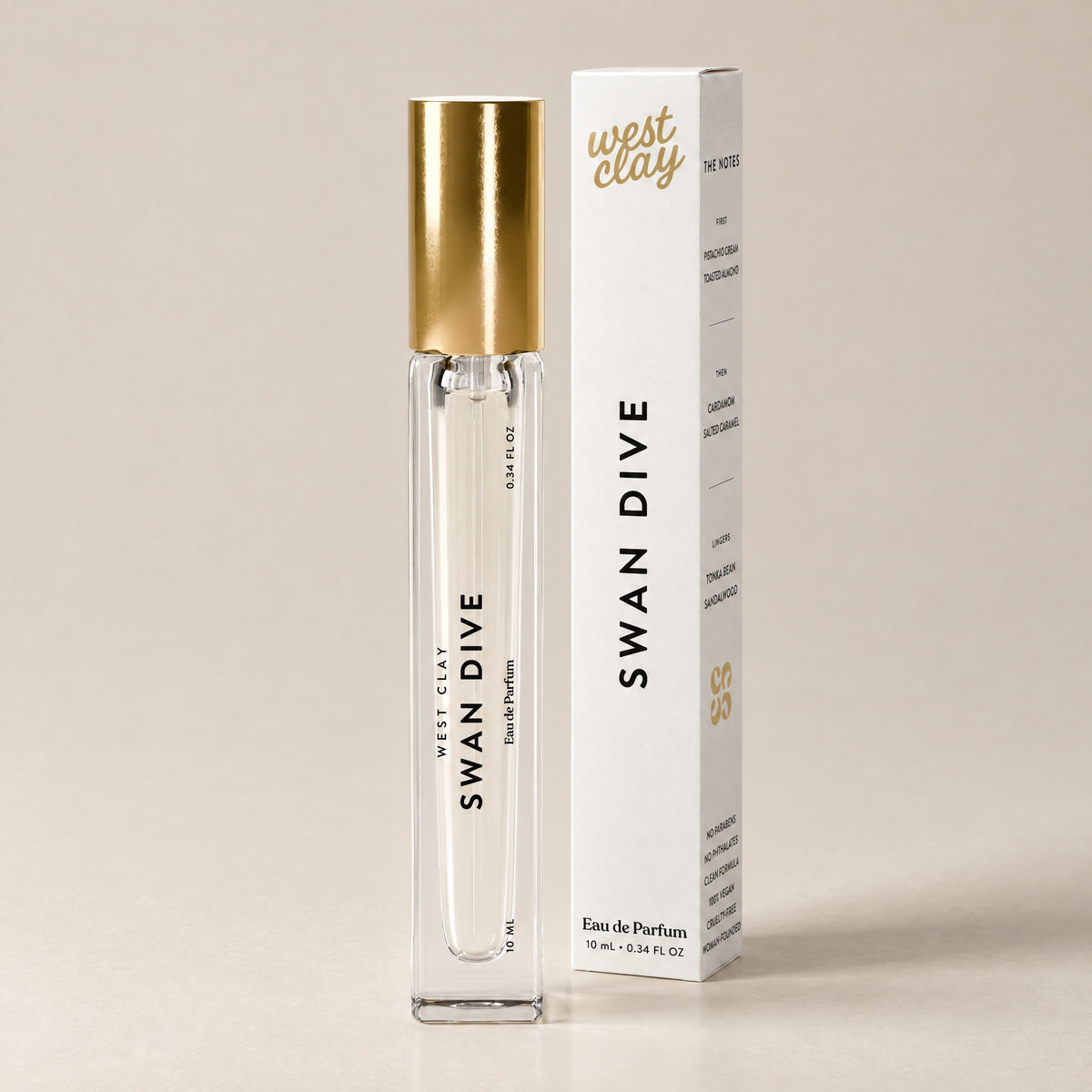 Swan Dive Eau de Parfum by West Clay, 10 mL travel size vial and box studio photo